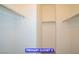Walk-in closet with multiple rods for ample clothing storage at 9710 Geiger Peak Ct, Las Vegas, NV 89148