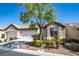 Charming single-story home features a well-manicured yard, mature trees and a two car garage at 9710 Geiger Peak Ct, Las Vegas, NV 89148