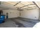 Clean two-car garage offering ample parking and storage space, enhancing functionality at 9710 Geiger Peak Ct, Las Vegas, NV 89148