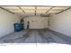 Spacious two-car garage offering ample parking and storage space, enhancing functionality at 9710 Geiger Peak Ct, Las Vegas, NV 89148