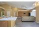 Open-concept living space featuring modern flooring, neutral paint and seamless flow at 9710 Geiger Peak Ct, Las Vegas, NV 89148