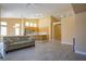 Open floor plan showcases a spacious living area connected to kitchen and dining at 9710 Geiger Peak Ct, Las Vegas, NV 89148