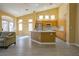 Bright living space featuring an open floor plan with modern kitchen, recessed lighting and lots of light at 9710 Geiger Peak Ct, Las Vegas, NV 89148