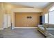 Bright living room with neutral paint, modern flooring, and white trim at 9710 Geiger Peak Ct, Las Vegas, NV 89148