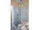 Modern shower with clear glass enclosure, shelving alcoves, and contemporary fixtures at 9710 Geiger Peak Ct, Las Vegas, NV 89148