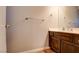 Well-lit bathroom featuring a vanity with dark wood cabinets and modern fixtures at 982 Flapjack Dr, Henderson, NV 89014