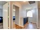 Hallway featuring hardwood floors, built-in storage and natural light at 982 Flapjack Dr, Henderson, NV 89014