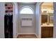 Hallway with storage cabinet and a closet leading to the double sink main bathroom at 982 Flapjack Dr, Henderson, NV 89014