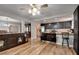 Open concept kitchen with island and breakfast bar overlooking the dining area at 982 Flapjack Dr, Henderson, NV 89014