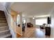 Inviting living room featuring hardwood floors, comfortable seating, and abundant natural light at 982 Flapjack Dr, Henderson, NV 89014
