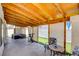 Covered patio area with an outdoor dining area and lounging space at 982 Flapjack Dr, Henderson, NV 89014