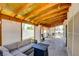 Covered patio area includes outdoor furniture and leads to the backyard at 982 Flapjack Dr, Henderson, NV 89014