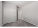 Bedroom showcases neutral walls, carpeted floors, closet and entry door at 10257 Sequoia Falls Pl, Las Vegas, NV 89149