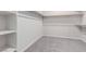 Walk-in closet with carpet and shelving units at 10257 Sequoia Falls Pl, Las Vegas, NV 89149