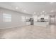 Spacious open-concept kitchen and living area featuring modern appliances and bright lighting at 10257 Sequoia Falls Pl, Las Vegas, NV 89149