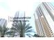 Elegant high-rise condos with sleek design, palm trees, and a modern aesthetic at 125 E Harmon Ave # 321, Las Vegas, NV 89109