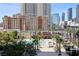 View overlooking the refreshing pool, surrounded by palm trees and close to Las Vegas attractions at 125 E Harmon Ave # 321, Las Vegas, NV 89109