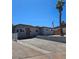 Charming single-story home with modern design elements and desert landscaping at 131 Copper St, Henderson, NV 89015