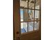 View through the door to the laundry area with washer and dryer and bright lighting at 131 Copper St, Henderson, NV 89015