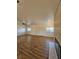 Bright, open living room with wood flooring, fireplace, and abundant natural light at 131 Copper St, Henderson, NV 89015