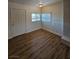Cozy living room with wood floors, natural light, and easy access at 131 Copper St, Henderson, NV 89015