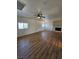 Open-concept living space featuring wood floors, recessed lighting, and fireplace at 131 Copper St, Henderson, NV 89015