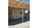The covered patio features sleek concrete and lots of sunlight at 131 Copper St, Henderson, NV 89015
