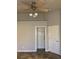 Bedroom featuring vaulted ceilings, ceiling fan, closet and tile floors at 1712 Matador Way, Las Vegas, NV 89128