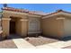Welcoming front view of home featuring low maintenance desert landscaping, walkway, and covered entrance at 1712 Matador Way, Las Vegas, NV 89128