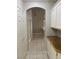 The hallway features tile floors and natural light at 1712 Matador Way, Las Vegas, NV 89128