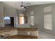 Spacious living room featuring high ceilings, neutral paint, and large windows at 1712 Matador Way, Las Vegas, NV 89128