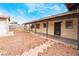 Backyard featuring patio, desert landscaping, and a covered porch area. Great for outdoor living and entertaining at 1733 N Michael Way, Las Vegas, NV 89108