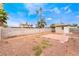 Expansive backyard offering desert landscaping, storage shed, and a spacious patio area for outdoor enjoyment at 1733 N Michael Way, Las Vegas, NV 89108
