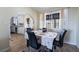 Dining room features tile floors, an arched entryway, and is adjacent to the kitchen at 1733 N Michael Way, Las Vegas, NV 89108