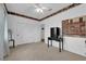 Cozy bedroom boasts a ceiling fan, artwork, closet and neutral carpeting throughout at 1893 Donnington Ct, Las Vegas, NV 89123