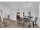 Bright and airy dining area with views of the backyard at 1893 Donnington Ct, Las Vegas, NV 89123
