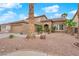 Lovely single-Gathering home with a two-car garage and desert landscaping at 1893 Donnington Ct, Las Vegas, NV 89123