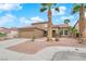 Beautiful home featuring a two-car garage, desert landscaping, and a tile roof at 1893 Donnington Ct, Las Vegas, NV 89123