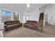 Bright and airy living room with high ceilings and comfortable seating at 1893 Donnington Ct, Las Vegas, NV 89123