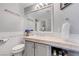 Well-maintained bathroom with a vanity, toilet, and stylish decor at 2016 Catalina Marie Ave, Henderson, NV 89074
