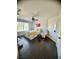 Bright bedroom with hardwood floor, large window, and ample space for furniture arrangement and customization at 2016 Catalina Marie Ave, Henderson, NV 89074