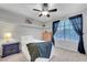 Cozy bedroom with soft carpet, dresser, and bedside table at 2016 Catalina Marie Ave, Henderson, NV 89074