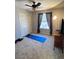 Functional bedroom featuring carpet, a built in closet, a window to bring in natural light, and modern amenities at 2016 Catalina Marie Ave, Henderson, NV 89074