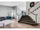 Spacious entryway with a staircase, wood flooring, and plenty of natural light at 2016 Catalina Marie Ave, Henderson, NV 89074