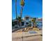 Charming two-story home featuring a landscaped yard with mature palm trees and a two car garage at 2016 Catalina Marie Ave, Henderson, NV 89074