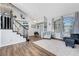 Inviting living room showcasing a staircase, natural light and modern decor at 2016 Catalina Marie Ave, Henderson, NV 89074
