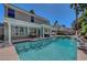 Stunning pool with a covered patio, grill, and lush backyard at 2016 Catalina Marie Ave, Henderson, NV 89074