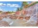 Welcome to Anthem: Impressive community entrance with cascading waterfalls and rock features at 2158 Alyssa Jade Dr, Henderson, NV 89052