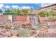 Community entrance with cascading waterfalls and lush landscaping at 2158 Alyssa Jade Dr, Henderson, NV 89052
