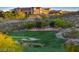 Beautiful golf course view with lush green grass, trees, and sand traps at Sun City Anthem at 2158 Alyssa Jade Dr, Henderson, NV 89052